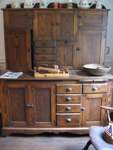 I really, really like these Hoosier cabinets. I would love to have one in my new kitchen and I will have room in front of my pantry wall.